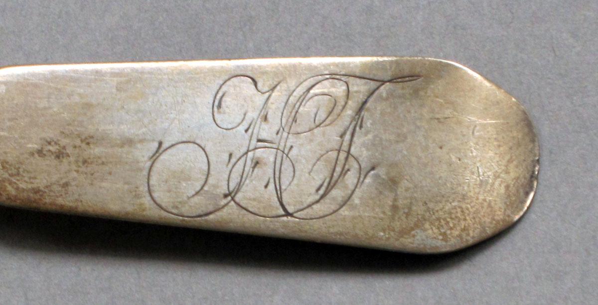 1962.0240.554 Silver spoon engraving