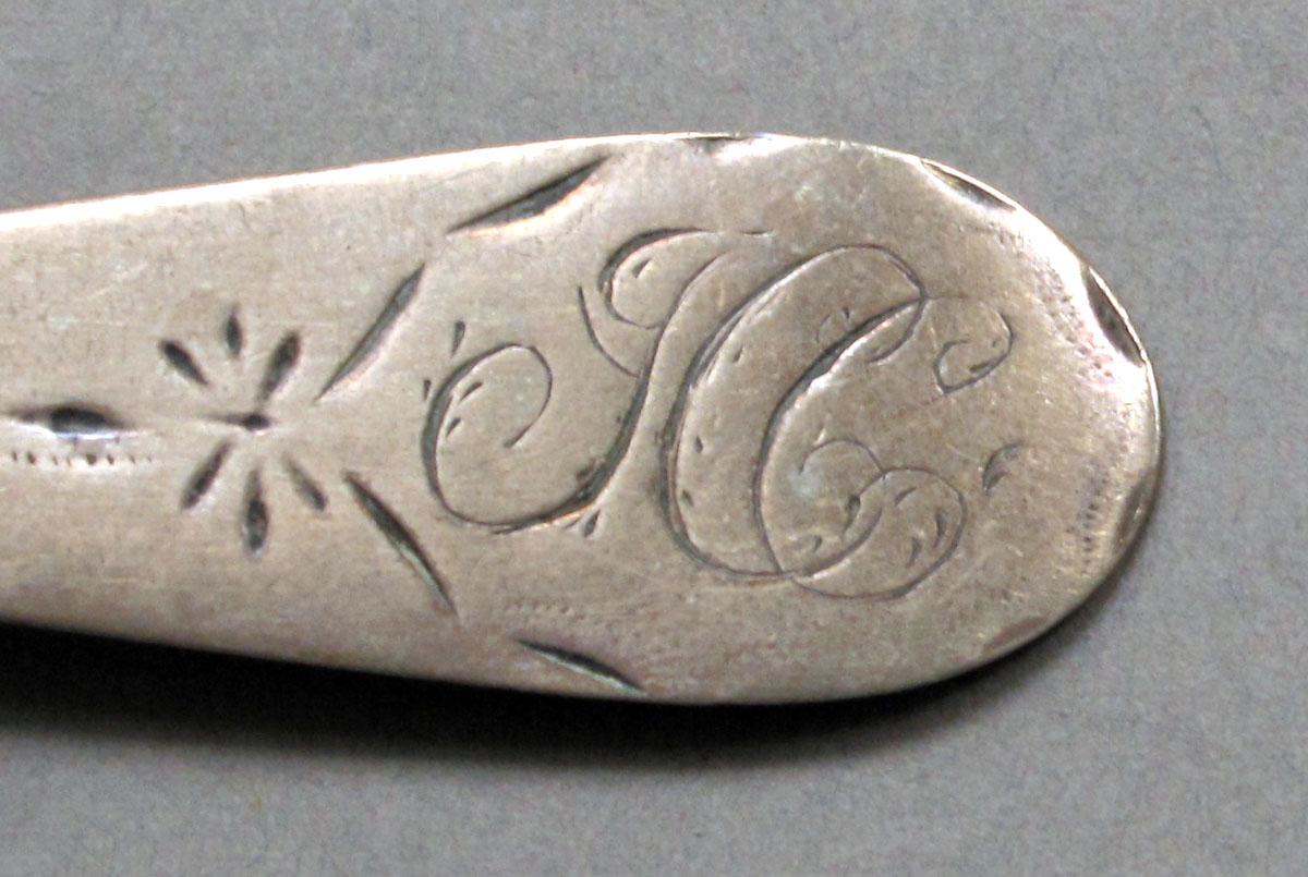 1962.0240.556 Silver spoon engraving