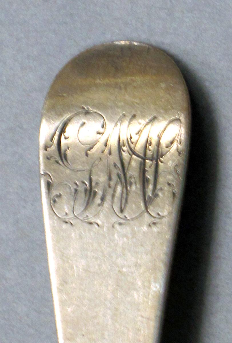 1962.0240.557 Silver spoon engraving