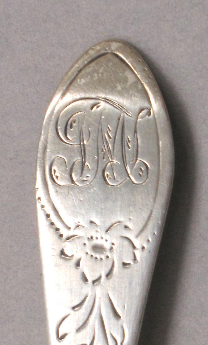 1962.0240.560 Silver spoon engraving
