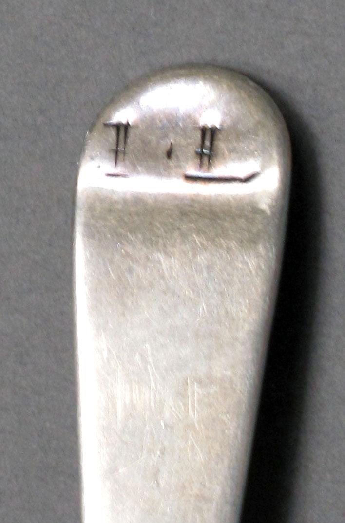 1962.0240.562 Silver spoon engraving