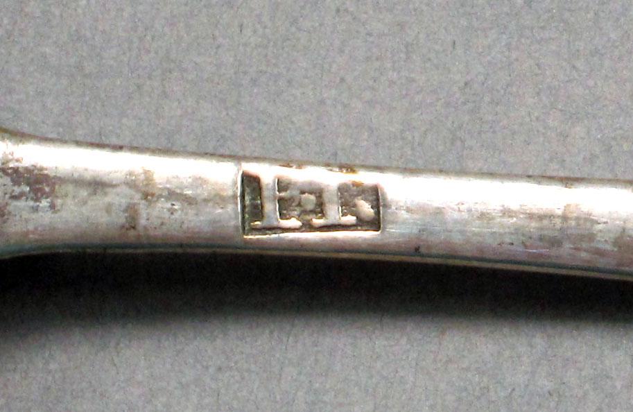 1962.0240.562 Silver spoon mark