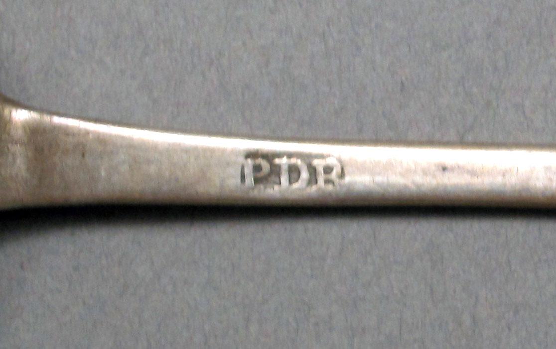 1962.0240.563 Silver spoon mark