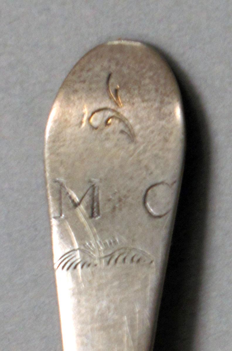 1962.0240.566 Silver spoon engraving