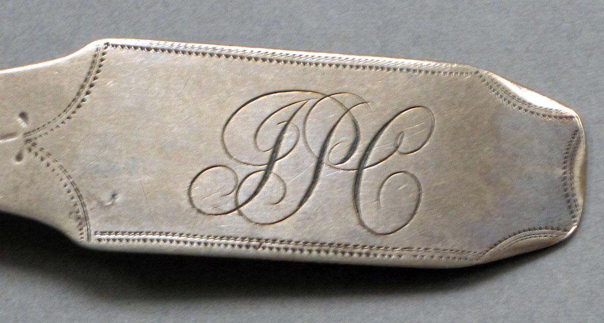 1962.0240.567 Silver spoon engraving