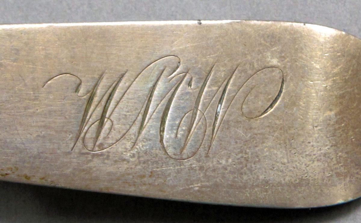 1962.0240.570 Silver spoon engraving
