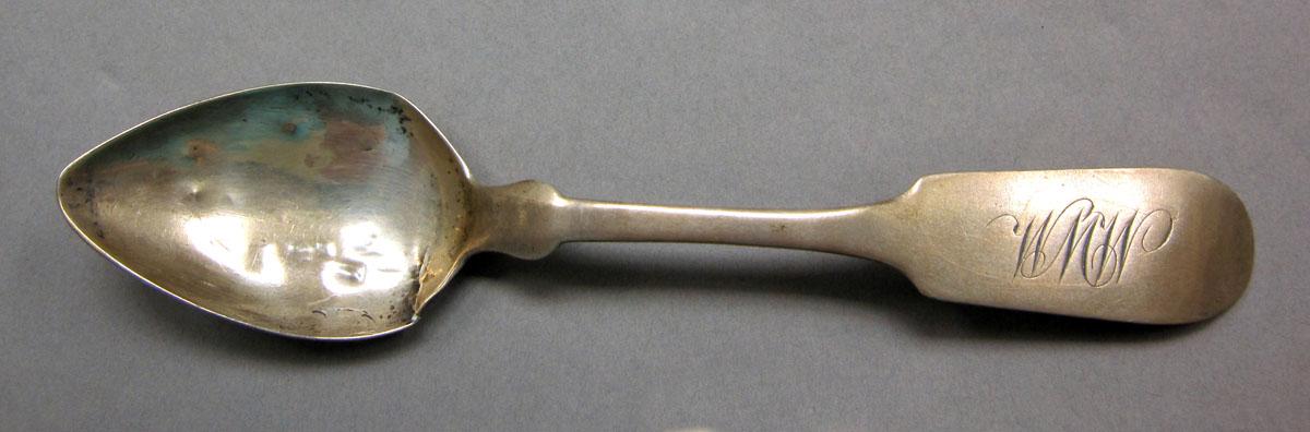 1962.0240.571 Silver spoon upper surface