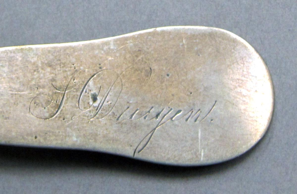 1962.0240.572 Silver spoon engraving