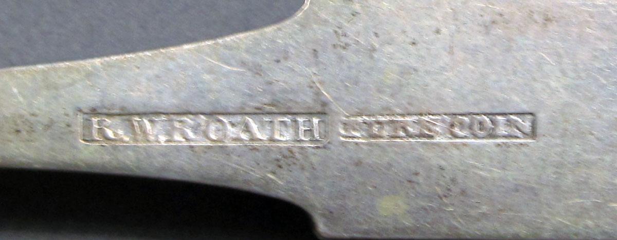 1962.0240.574 Silver spoon mark