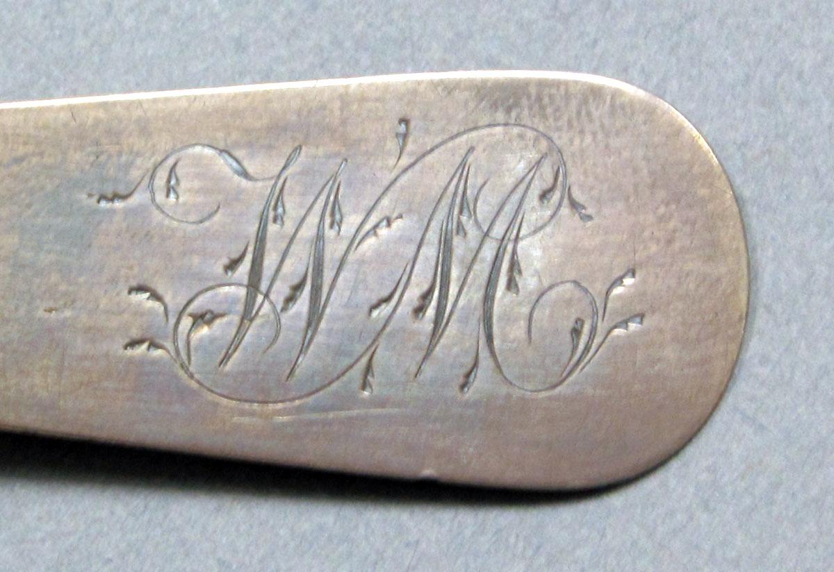 1962.0240.575 Silver spoon engraving