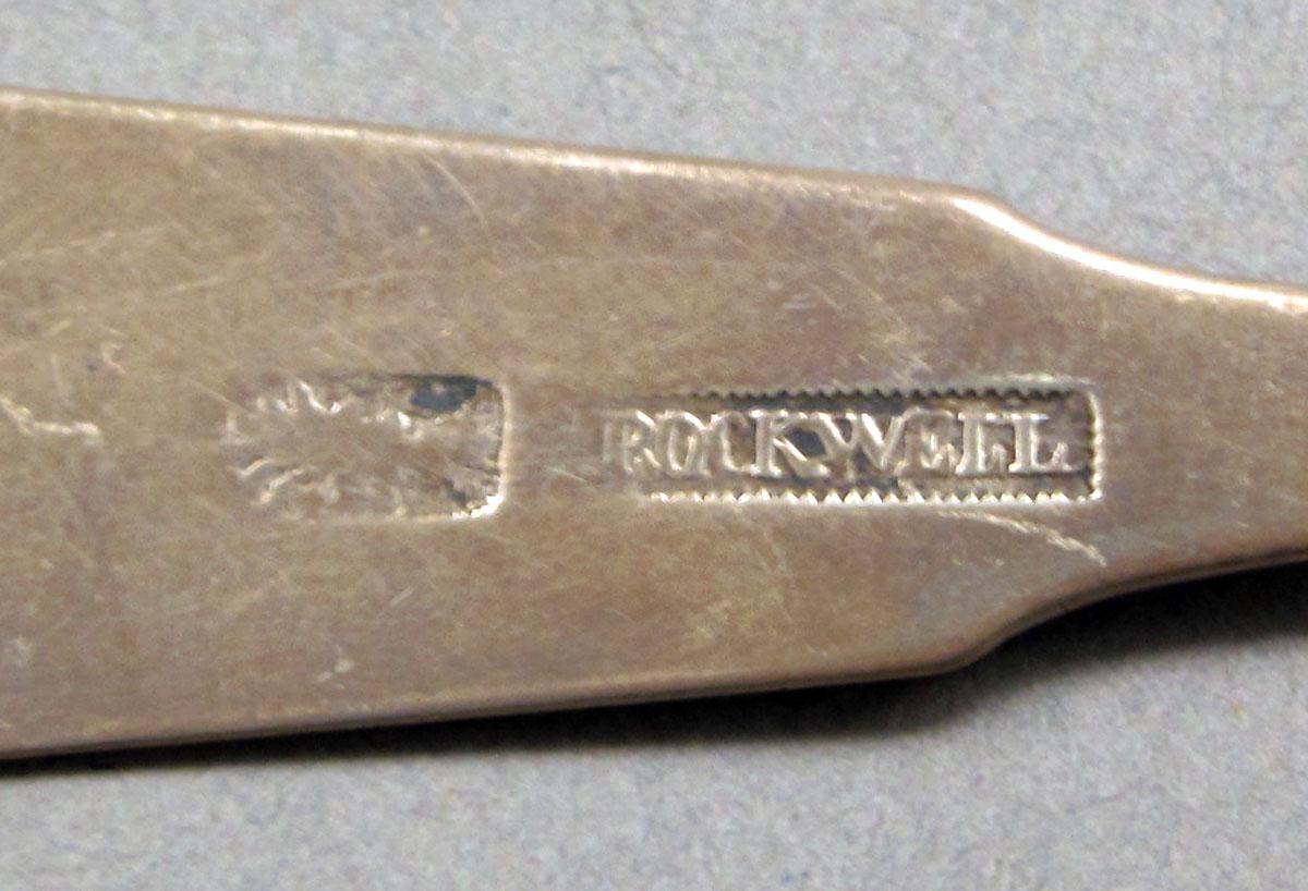 1962.0240.575 Silver spoon mark