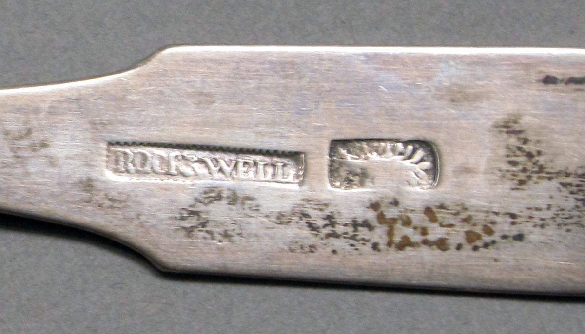 1962.0240.576 Silver spoon mark
