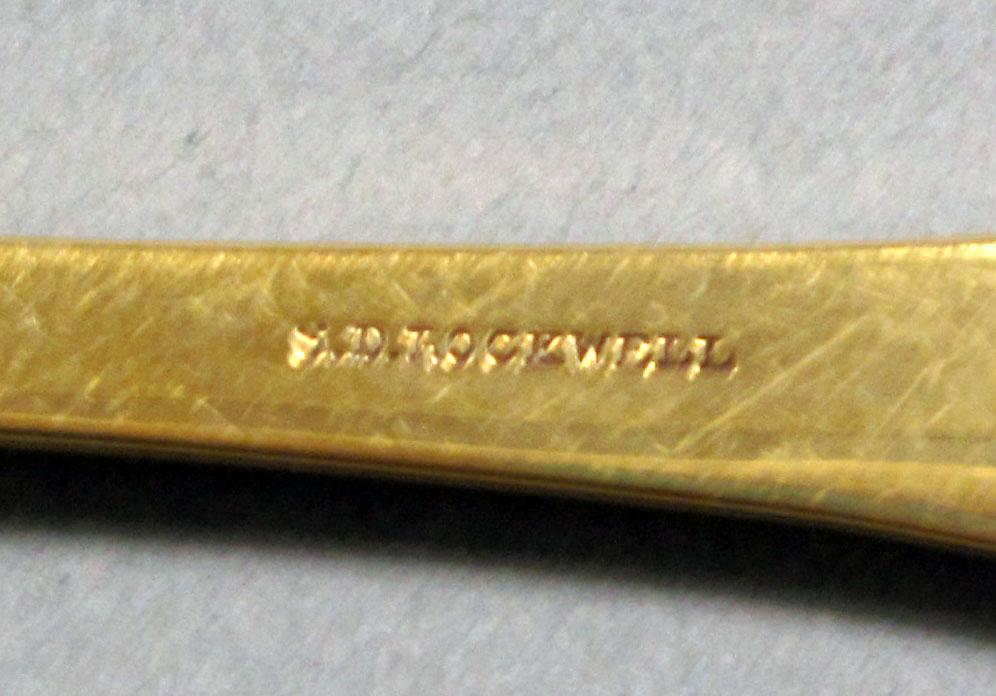 1962.0240.577 Gold spoon mark