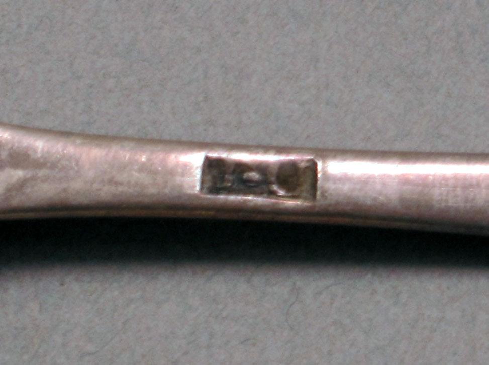 1962.0240.579 Silver spoon mark