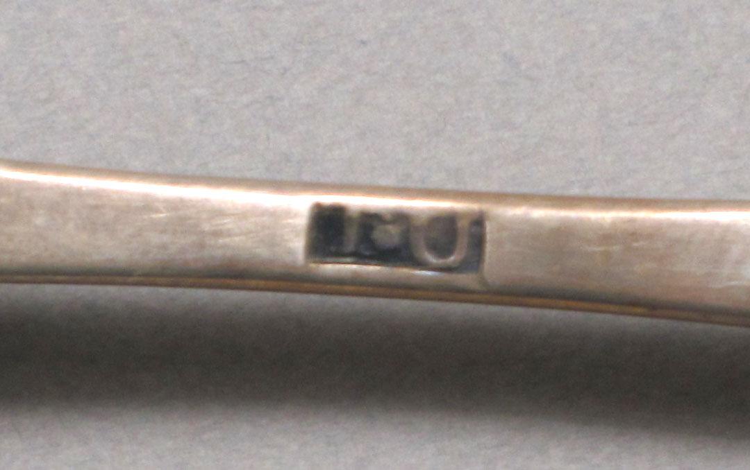 1962.0240.580 Silver spoon mark