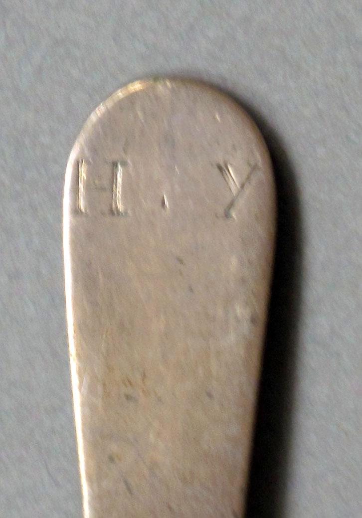 1962.0240.581 Silver spoon engraving