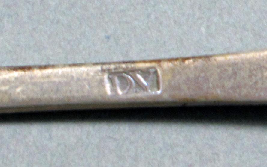 1962.0240.581 Silver spoon mark
