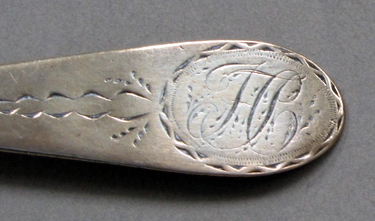 1962.0240.584 Silver spoon engraving