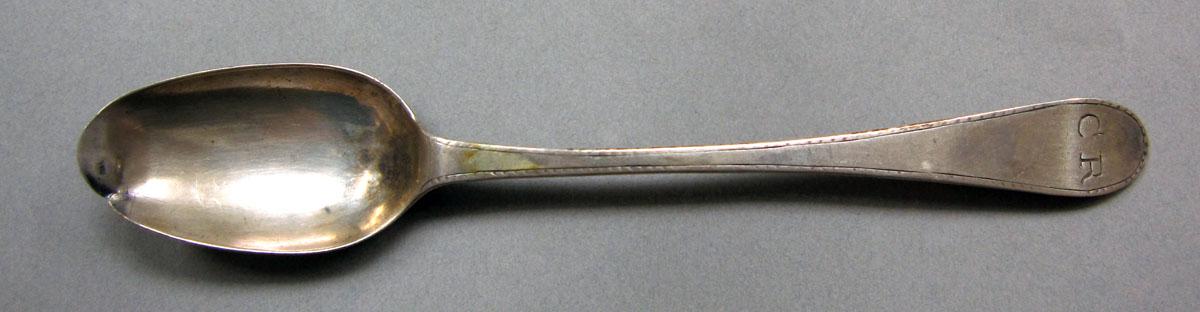 1962.0240.585 Silver spoon upper surface