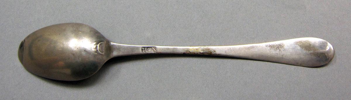 1962.0240.585 Silver spoon underside