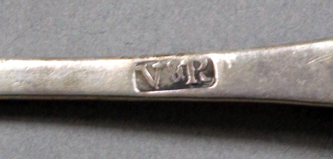 1962.0240.585 Silver spoon mark
