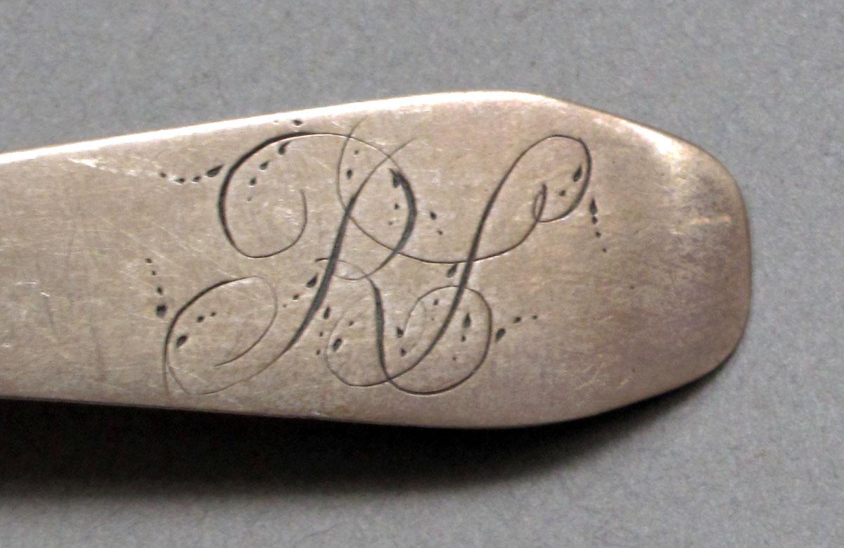 1962.0240.589 Silver spoon engraving