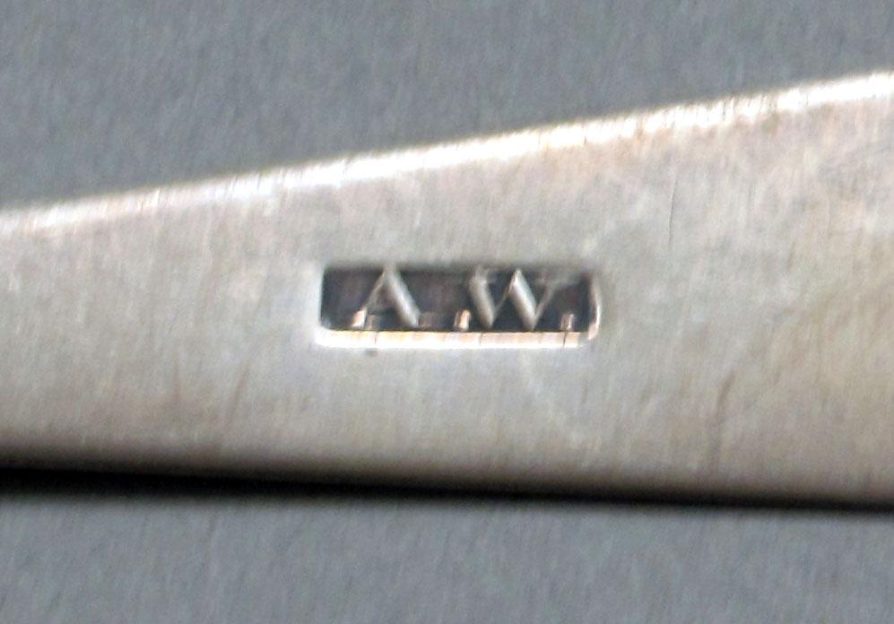 1962.0240.589 Silver spoon mark