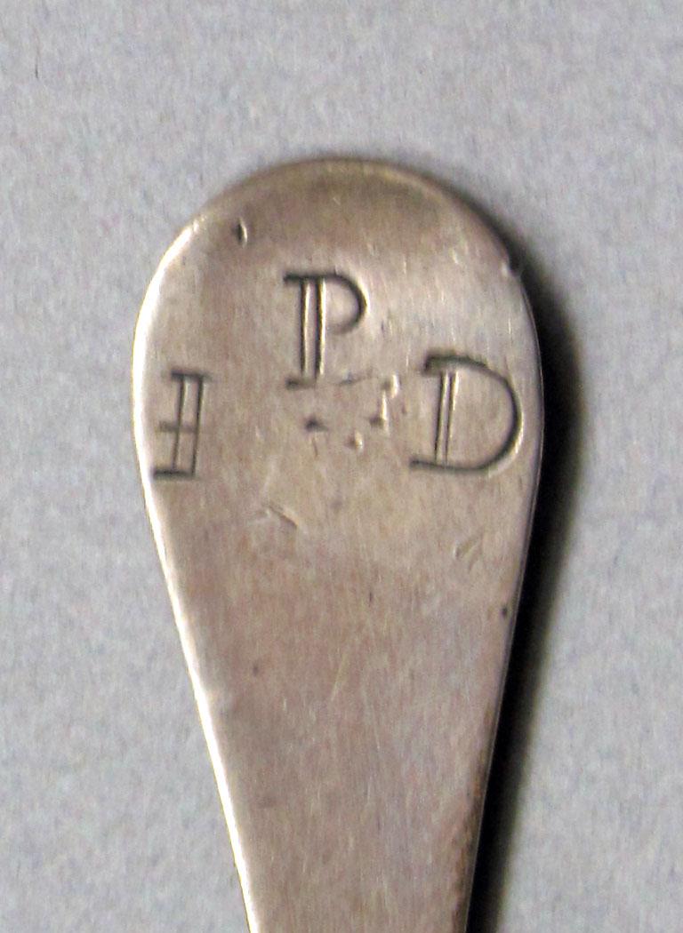 1962.0240.591 Silver spoon engraving