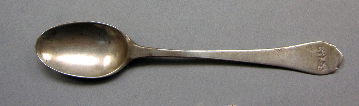 1962.0240.594 Silver spoon upper surface