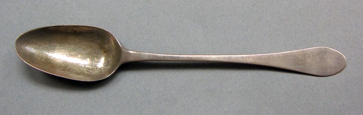 1962.0240.595 Silver spoon upper surface