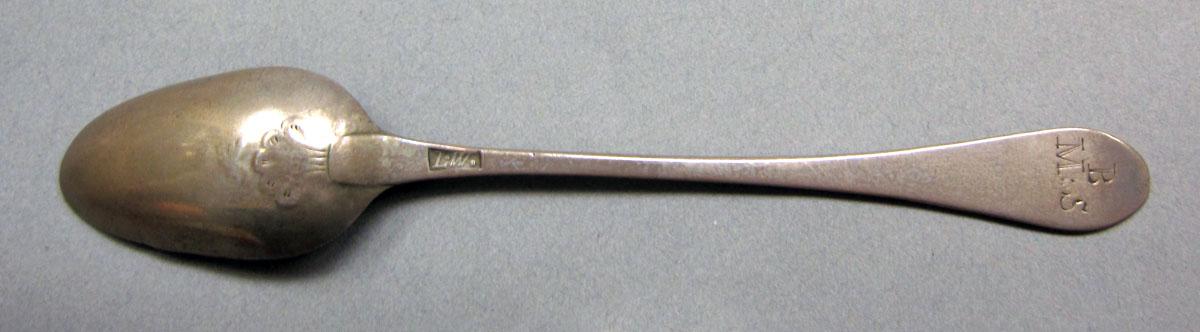 1962.0240.595 Silver spoon underside