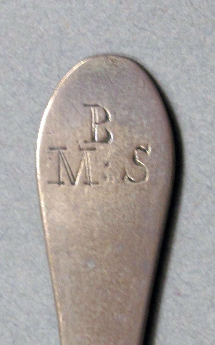 1962.0240.595 Silver spoon engraving