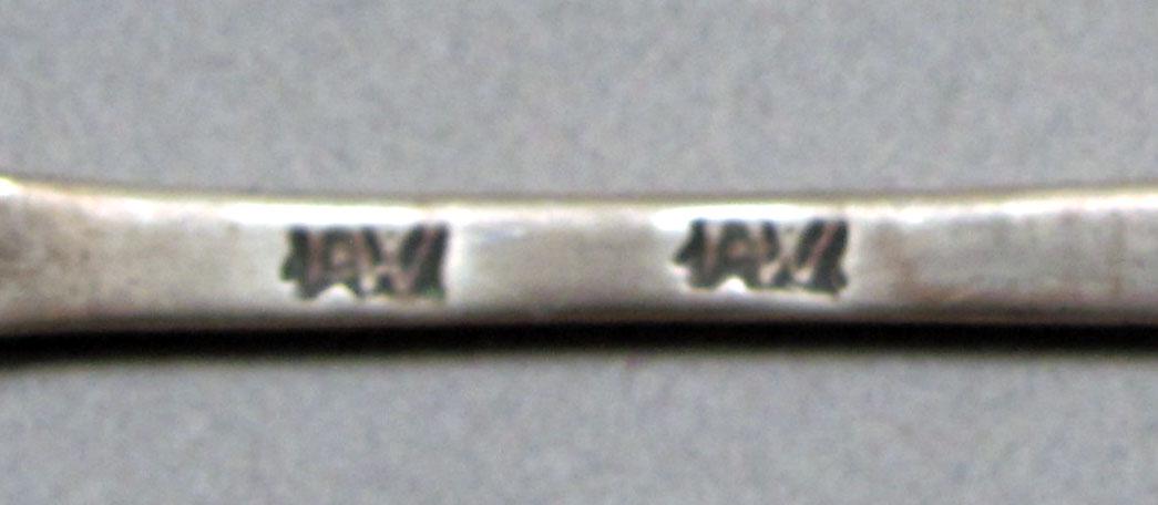 1962.0240.598 Silver spoon mark
