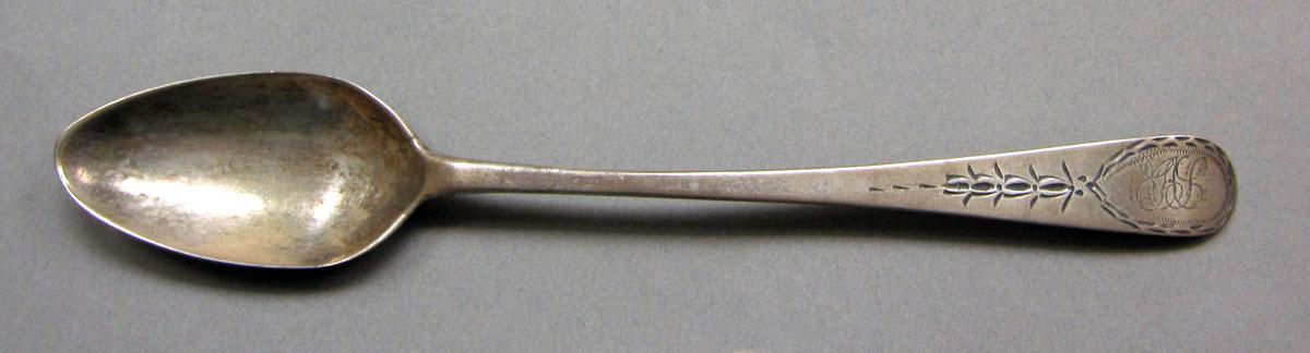 1962.0240.599 Silver spoon upper surface