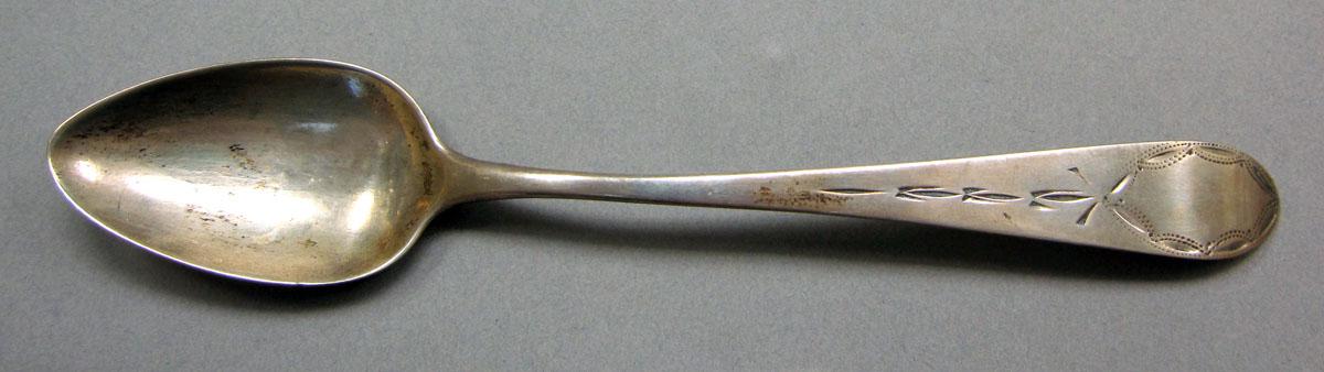 1962.0240.601 Silver spoon upper surface