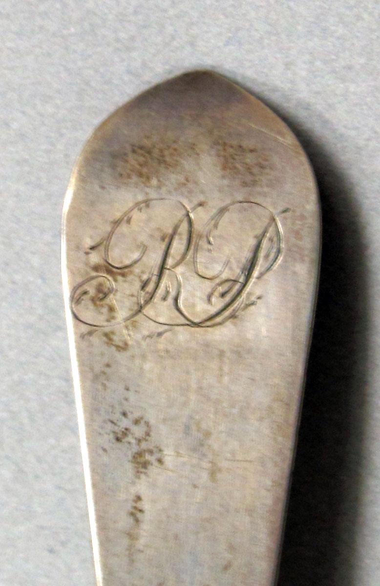 1962.0240.602 Silver spoon engraving