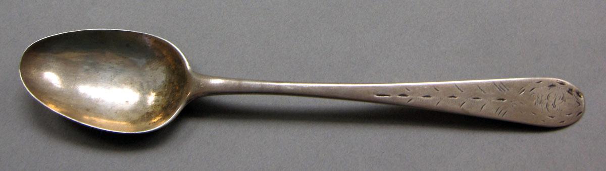 1962.0240.604 Silver spoon upper surface
