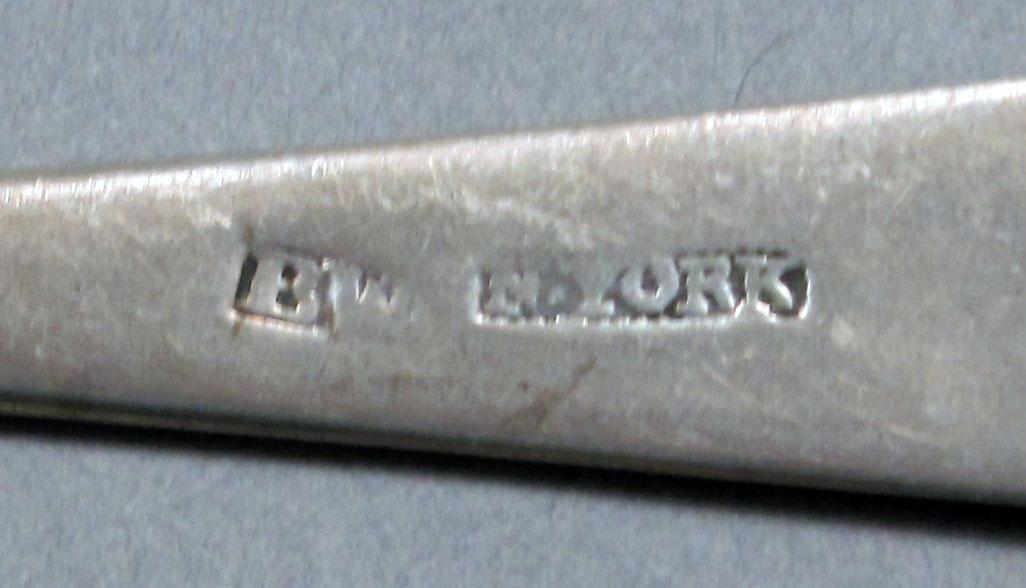 1962.0240.604 Silver spoon mark
