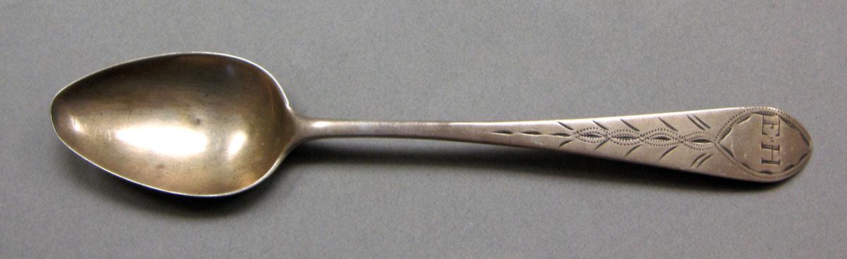 1962.0240.605 Silver spoon upper surface