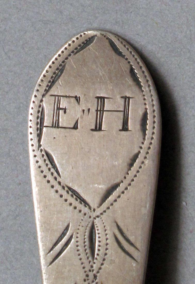 1962.0240.605 Silver spoon engraving