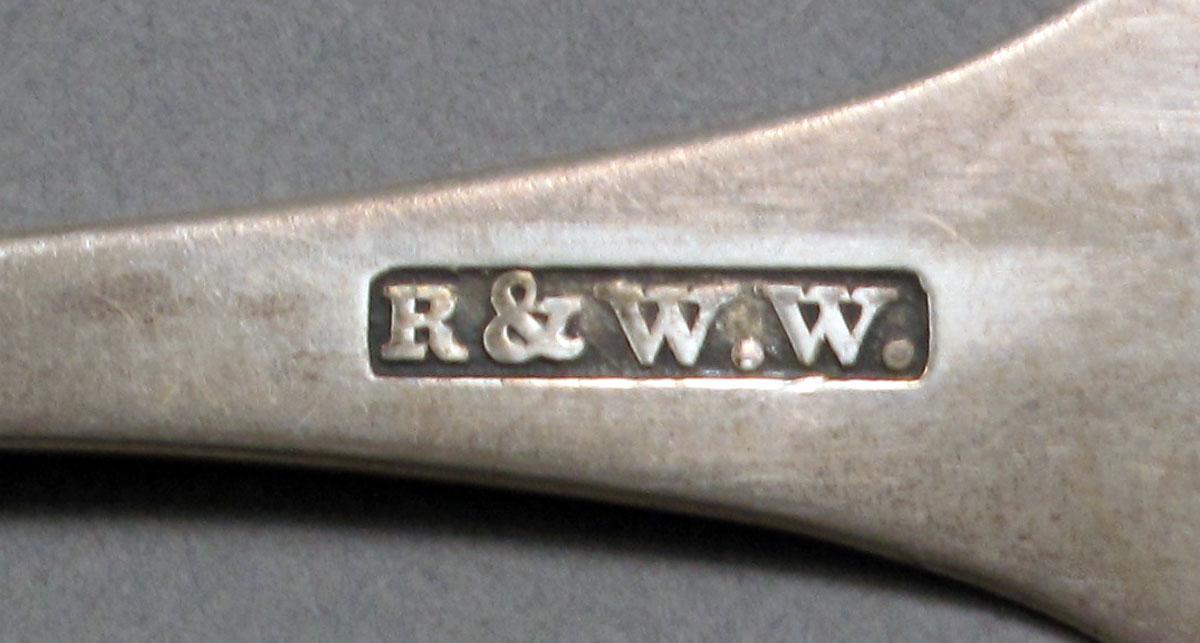1962.0240.606 Silver spoon mark