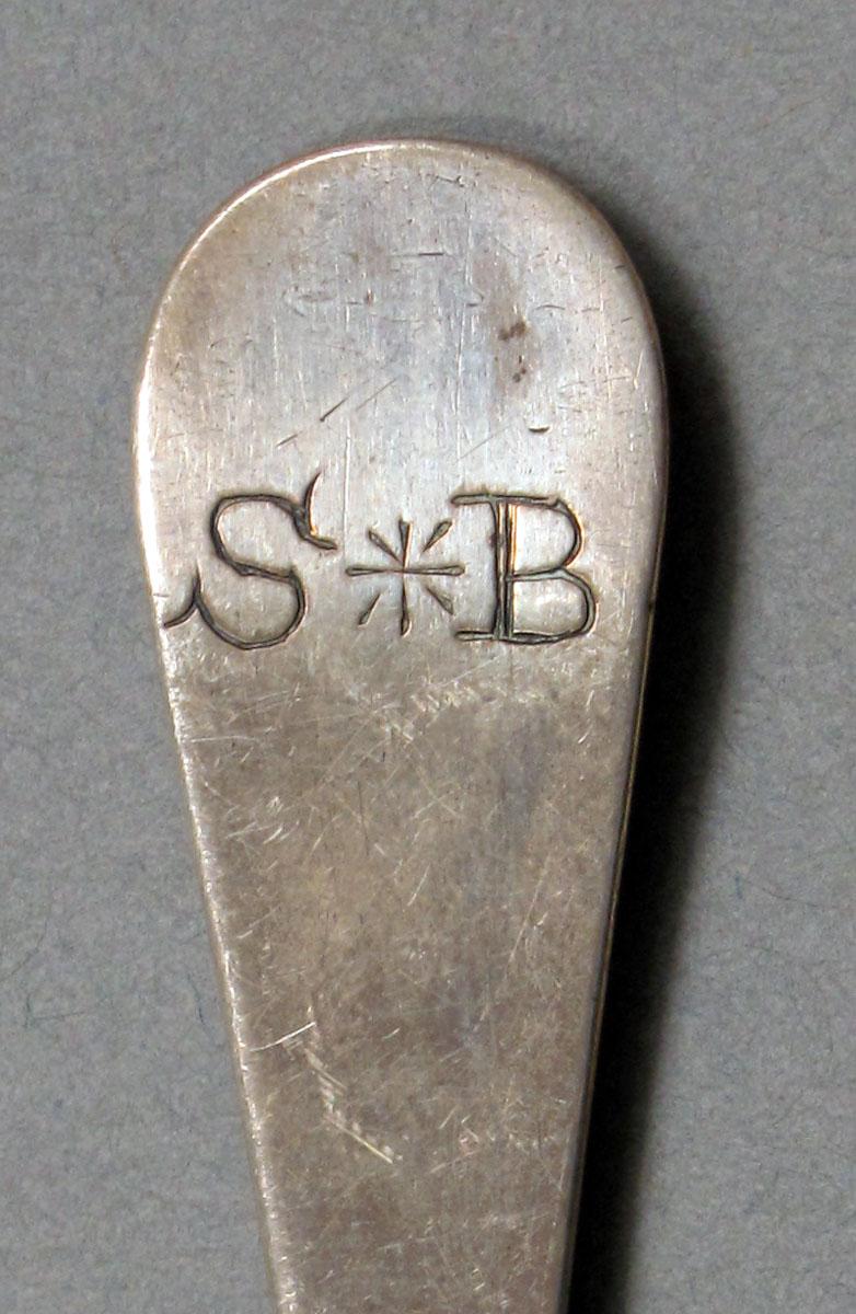 1962.0240.607 Silver spoon engraving
