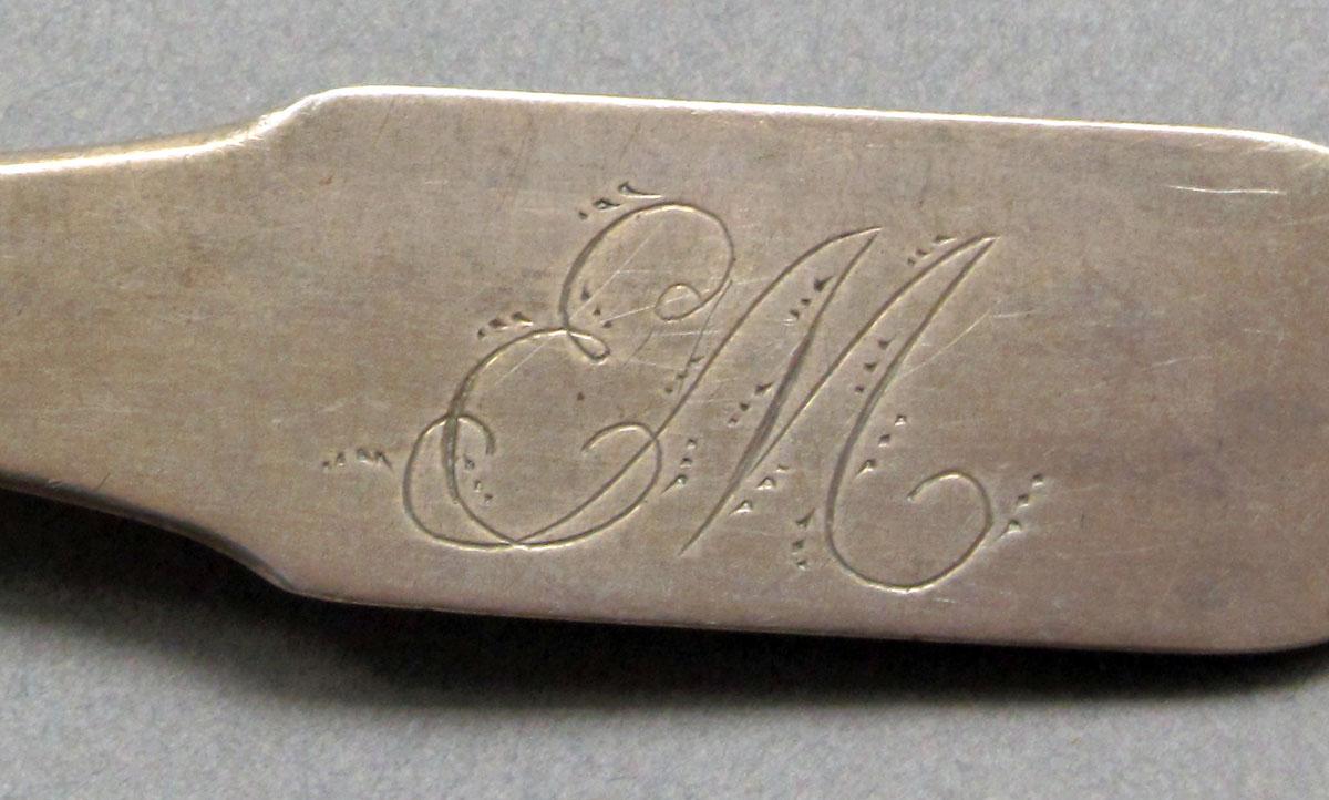 1962.0240.608 Silver spoon engraving