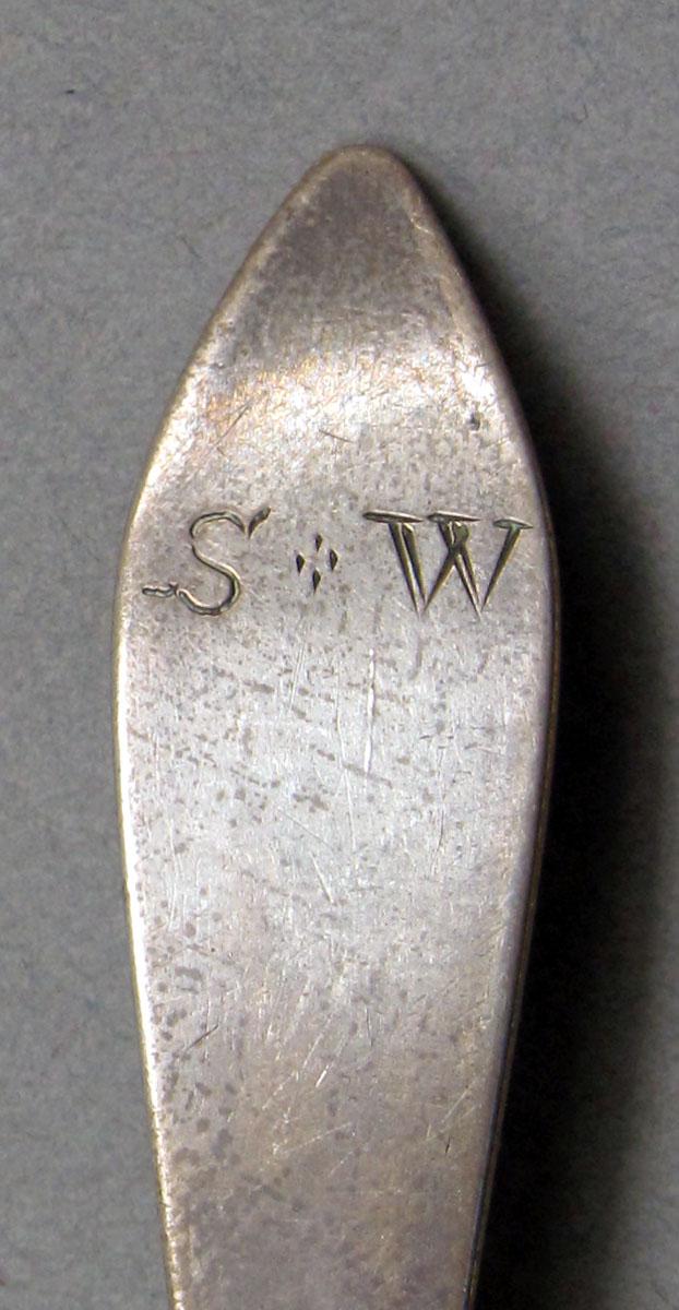 1962.0240.609 Silver spoon engraving