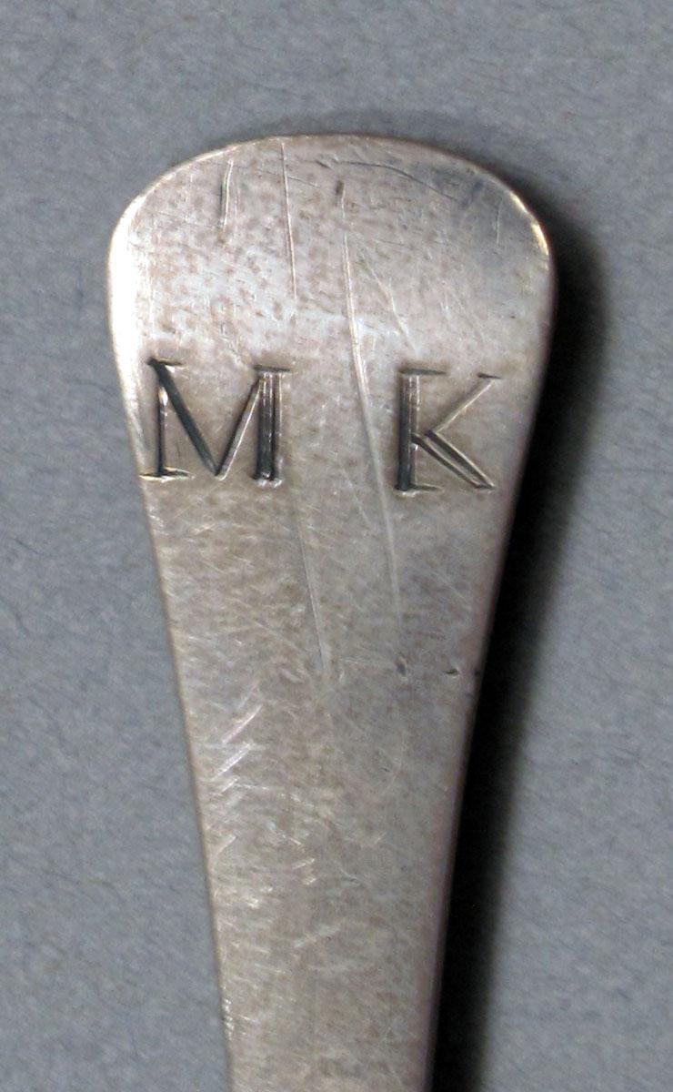 1962.0240.610 Silver spoon engraving