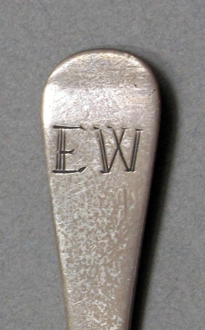 1962.0240.611 Silver spoon engraving