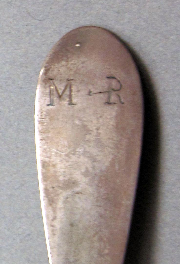 1962.0240.612 Silver spoon engraving