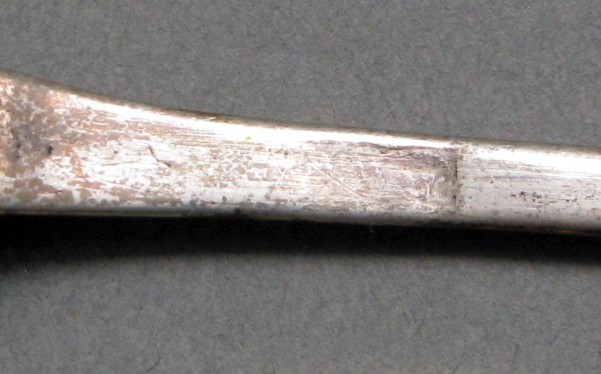 1962.0240.613 Silver spoon mark