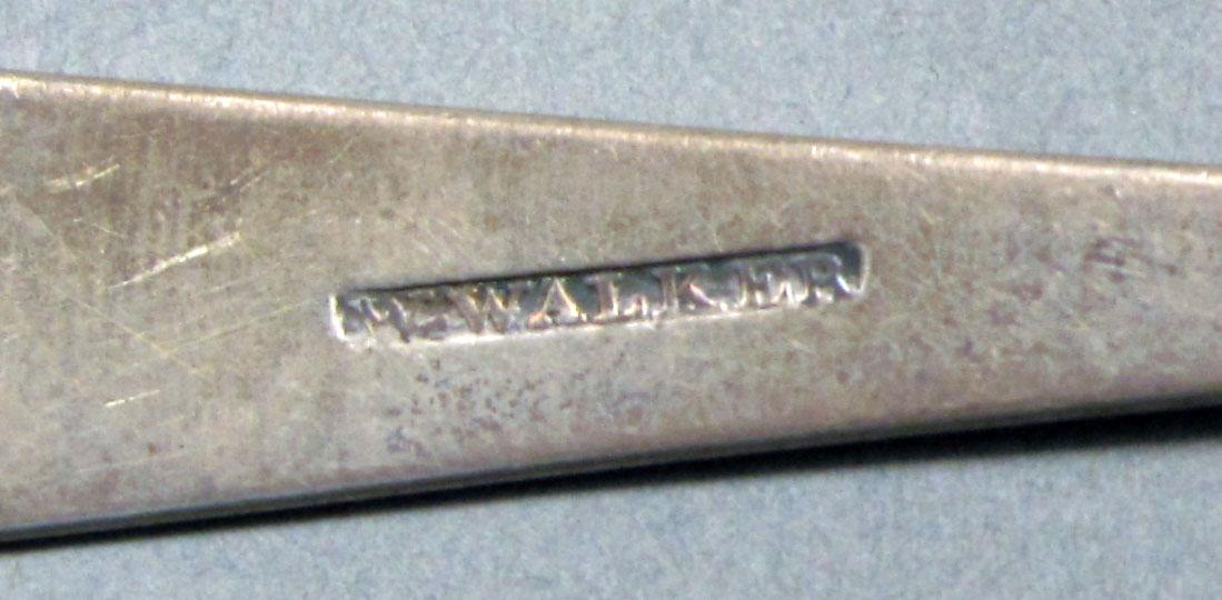 1962.0240.614 Silver spoon mark