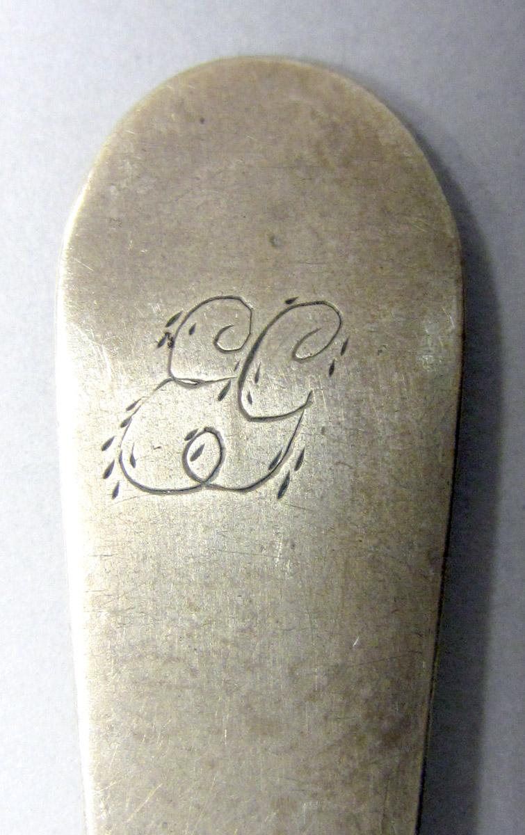 1962.0240.616 Silver spoon engraving